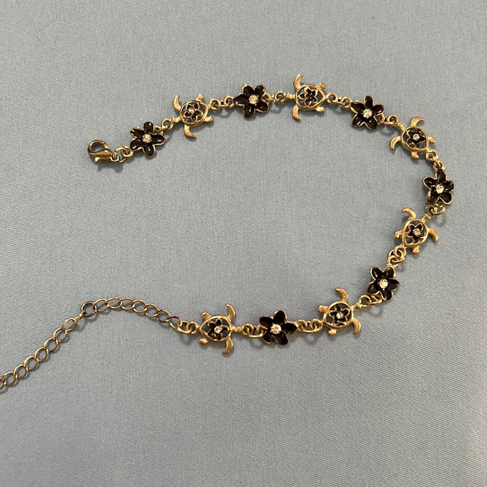 Beautiful silver and black floral bracelet. Bought in India.